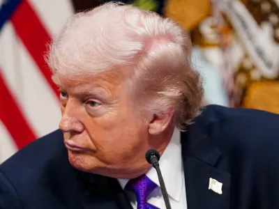 FILE PHOTO: U.S. President Donald Trump attends a roundtable on the Ratepayer Protection Pledge in the Indian Treaty Room in the Eisenhower Executive Office Building (EEOB) on the White House campus in Washington, D.C., U.S., March 4, 2026. REUTERS/Nathan Howard/File Photo