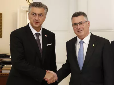 Israels's Foreign Minister Gideon Saar, right, is welcomed by Croatian Prime minister Andrej Plenkovic in Zagreb, Croatia, Tuesday, Sept. 9, 2025. (AP Photo)