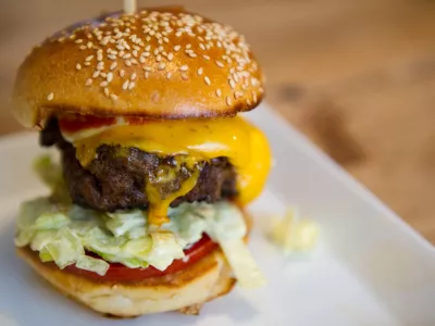 A chesseburger is pictured at the burger restaurant 'Richie 'n Rose' in Duesseldorf, Germany, 13 May 2014. More and more high-end fastfood restaurants, Pizza places and backeries are in competition with fastfood chains like McDonalds and Burger King. Photo by: Marius Becker/picture-alliance/dpa/AP Images