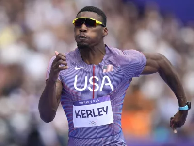 FILE - Fred Kerley, of the United States, competes in the men's 100-meter heats at the 2024 Summer Olympics, Aug. 3, 2024, in Saint-Denis, France. (AP Photo/Matthias Schrader, File)