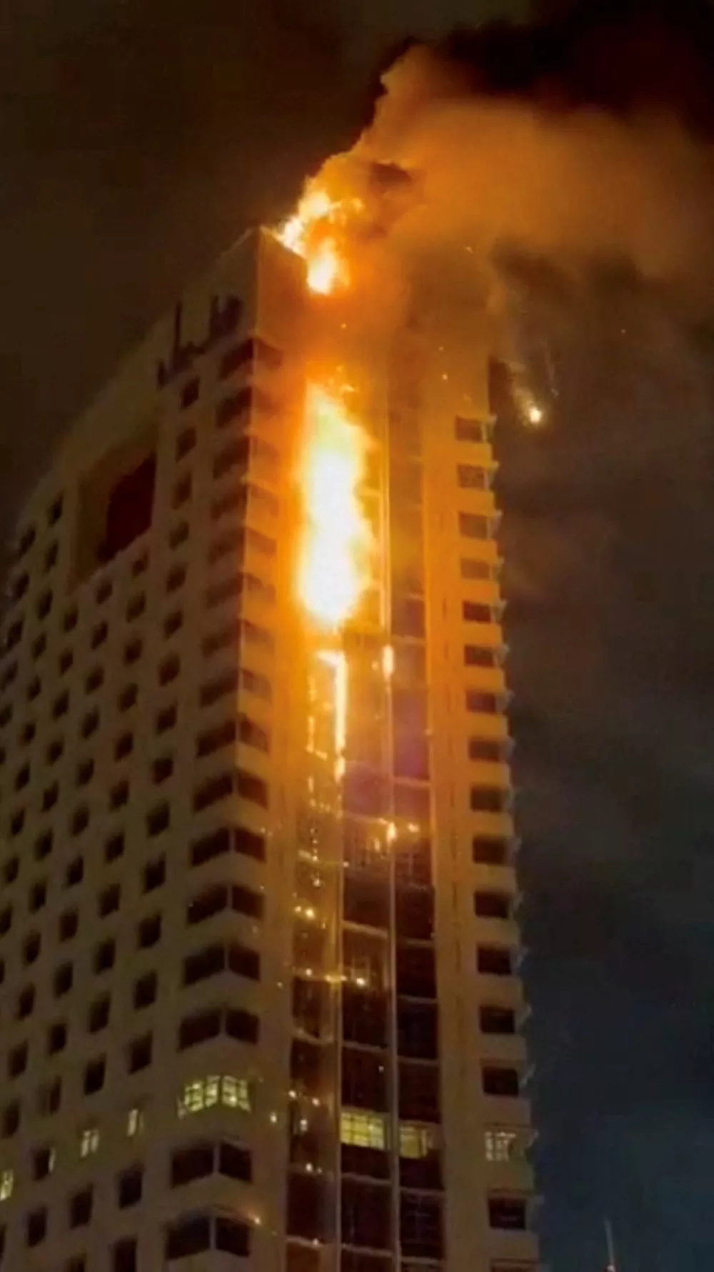 Smoke rises from a building on fire, in the aftermath of what the Kuwaiti Army says is a drone attack, amid the U.S.-Israeli conflict with Iran, in Kuwait City, Kuwait March 8, 2026 in this screengrab taken from a social media video. SOCIAL MEDIA/via REUTERS THIS IMAGE HAS BEEN SUPPLIED BY A THIRD PARTY. NO RESALES. NO ARCHIVES. VERIFICATION: Reuters was able to confirm the location from buildings, road layout, road signs and the bridge which matched file image and satellite images. Coordinates of the building being hit were at 29.362763799479662, 47.98382949072929. Reuters was able to confirm the date of the video from government statements and local news reports. Kuwait military wrote on X that some civilian facilities were damaged, and the General Organization for Social Insurance confirmed that the main building of the organization was targeted on March 8.   TPX IMAGES OF THE DAY