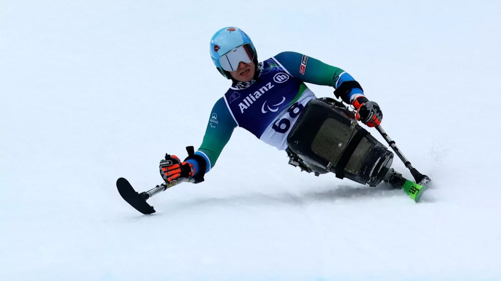 Milano Cortina 2026 Paralympics - Para Alpine Skiing - Men's Super-G Sitting - Tofane Alpine Skiing Centre, Belluno, Italy - March 09, 2026. Jernej Slivnik of Slovenia in action during the men's super-g sitting REUTERS/Lisi Niesner