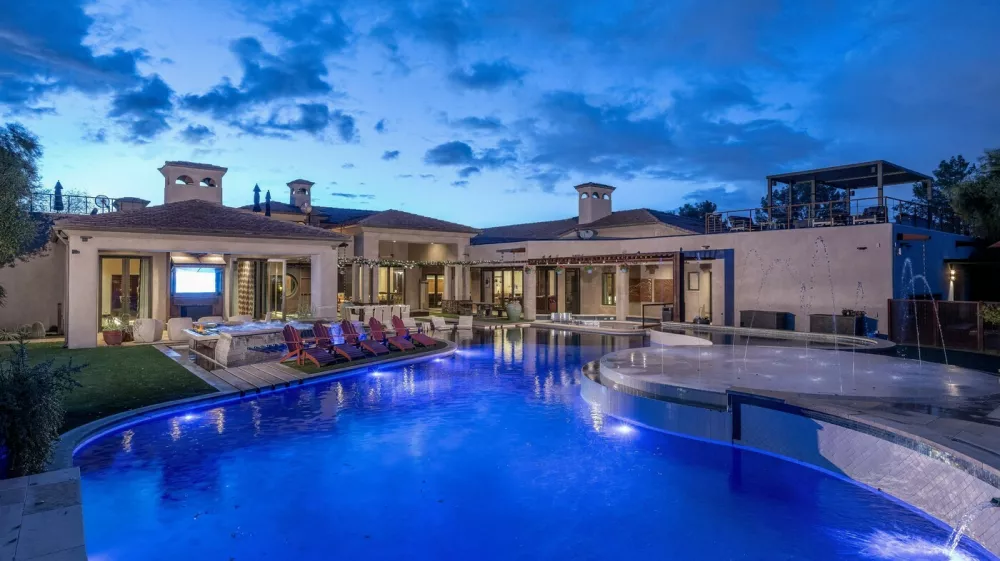 EXCLUSIVE: Story from Jam Press (Mega Bungalow Sale)Mega bungalow with own go-kart track and luxury man cave goes on sale for whopping Ł15mA jaw-dropping mega bungalow complete with its own go-kart track, underground shooting range and luxury man cave has hit the market for a staggering Ł15million.The eye-watering ranch-style pad boasts seven bedrooms and nine bathrooms &ndash; all spread across a sprawling 24,000 square feet of land.Described as the "ultimate sports and entertainment complex", the one-storey mansion is a playground for the super-rich.Built 23 years ago, the property comes with a six-car garage, a private cinema and even its own swimming pool.And if that wasn't enough, thrill-seekers can enjoy an underground shooting range and race mates on a private go-kart track.The mega-home is located in Gilbert, Maricopa County, Arizona, as reported by&nbsp;Luxury Property News.The lavish listing reads: "The main house has 9,326 square-feet of elegant living space with a six-stall garage and private movie theatre."The Hideaway Man Cave has 6,610 square-feet of entertainment/relaxation with a commercial kitchen, golf simulator, dance studio, batting cage, full fitness room and a studio apartment."The private day spa has 5,660 square-feet featuring a massage room, his-and-hers bathrooms, yoga room, hidden guest suite, dry sauna, steam room, spa shower and hot tub."The Go-Kart track is complete with six electric go-karts for endless outdoor fun."The underground shooting range has a two-lane, 185 foot-long gun range with a walk-in armoury."There is a Zen garden or greenhouse with perfectly manicured spaces for peace and tranquility."And an exotic animal enclosure, Koi ponds, baseball and full basketball court."The luxury estate is on sale with agents Compass for a cool 0million (Ł15million) &ndash; meaning only the deepest of pockets need apply.ENDSEDITOR'S NOTE:&nbsp;Video Usage Licence: (PROFESSIONAL.24 Feb 2026Pictured: Story from Jam Press (Mega Bungalow Sale)Mega bungalow with own go-kart track and luxury man cave goes on sale for whopping Ł15mA jaw-dropping mega bungalow complete with its own go-kart track, underground shooting range and luxury man cave has hit the market for a staggering Ł15million.The eye-watering ranch-style pad boasts seven bedrooms and nine bathrooms &ndash; all spread across a sprawling 24,000 square feet of land.Described as the "ultimate sports and entertainment complex", the one-storey mansion is a playground for the super-rich.Built 23 years ago, the property comes with a six-car garage, a private cinema and even its own swimming pool.And if that wasn't enough, thrill-seekers can enjoy an underground shooting range and race mates on a private go-kart track.The mega-home is located in Gilbert, Maricopa County, Arizona, as reported by&nbsp;Luxury Property News.The lavish listing reads: "The main house has 9,3.,Image: 1077930760, License: Rights-managed, Restrictions: NO Australia, Germany, Norway, South Korea, Sweden, United Kingdom, United States, Unknown Country, Model Release: no, Pictured: The incredible home for sale in Gilbert, Arizona