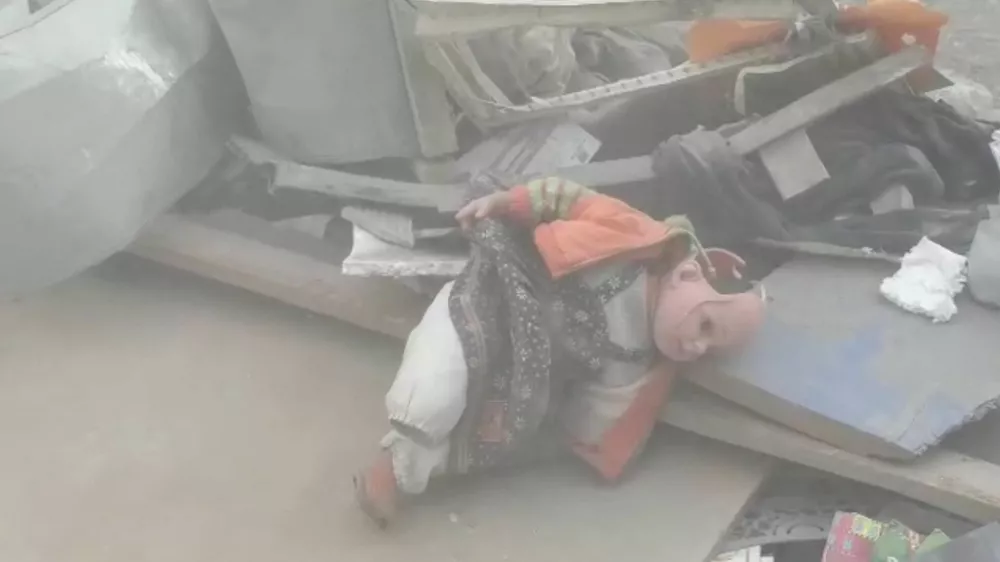 A damaged doll lies in the rubble of residential buildings after air strikes, in the Resalat neighborhood, in Tehran, Iran, in this screengrab obtained from a handout video released March 9, 2026. Iranian Red Crescent Society/Handout via REUTERS THIS IMAGE HAS BEEN SUPPLIED BY A THIRD PARTY. MANDATORY CREDIT. NO RESALES. NO ARCHIVES. Verification Lines: Road layout, building exterior and trees matched satellite imagery Coordinates of the damaged buildings: 35.73951256658418, 51.48752698828381 Date not verified but no older version of the video was found posted online before March 9. Local media reported that residential buildings in Resalat neighborhood got hit during air strikes on March 9