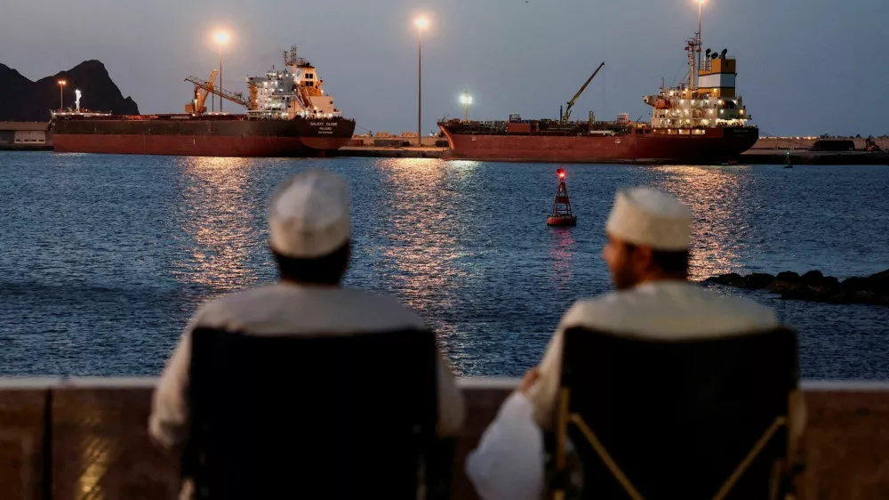 The Galaxy Globe bulk carrier and the Luojiashan tanker sit anchored as Iran vows to close the Strait of Hormuz, amid the U.S.-Israeli conflict with Iran, in Muscat, Oman, March 9, 2026. REUTERS/Benoit Tessier   TPX IMAGES OF THE DAY