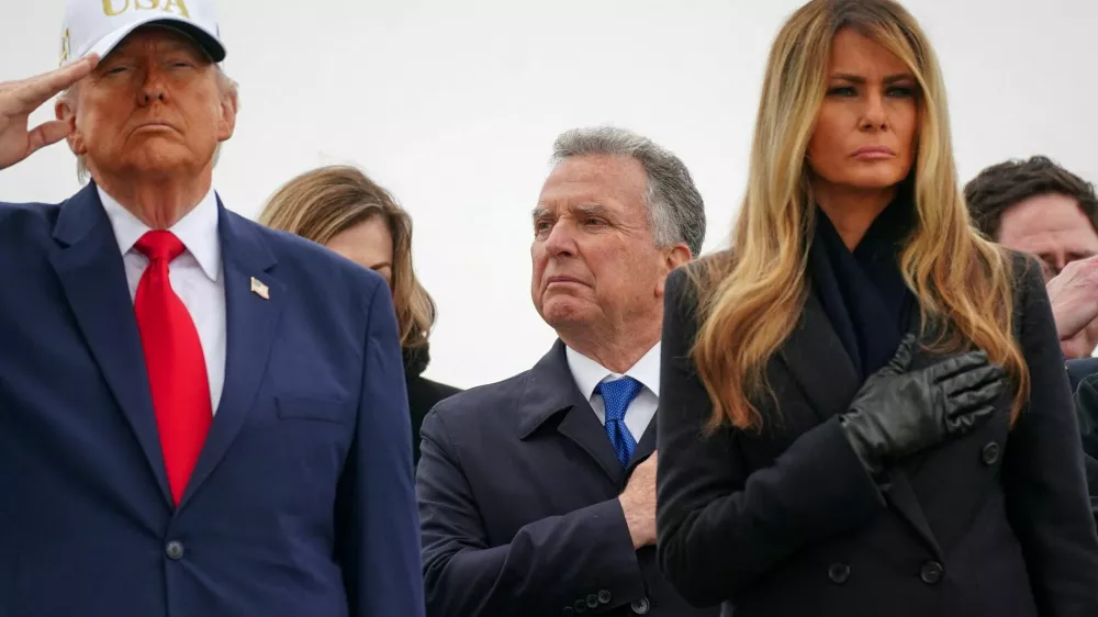 U.S. Special Envoy Steve&nbsp;Witkoff stands behind President Donald Trump and first lady Melania Trump during a dignified transfer of the remains of six U.S. Army service members of the 103rd Sustainment Command, who were killed in Kuwait, Major Jeffrey O'Brien, Capitain Cody Khork, Chief Warrant Officer 3 Robert Marzan, Sergeant 1st Class Nicole Amor, Sergeant 1st Class Noah Tietjens and Sergeant Declan Coady, amid the U.S.-Israeli conflict with Iran, at Dover Air Force Base in Dover, Delaware, U.S., March 7, 2026. REUTERS/Nathan Howard