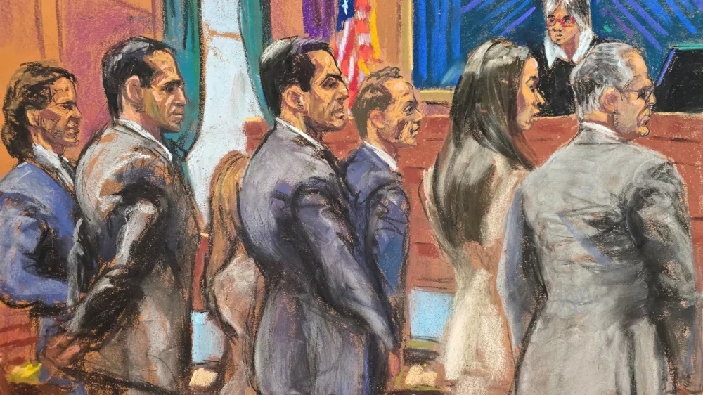 High-profile real estate agent brothers Alon Alexander, Oren Alexander and Tal Alexander stand with their legal team, including Marc Agnifilo, as the jury enters the court to deliver their verdict before Judge Valerie E. Caproni in New York City, U.S., March 9, 2026, in a courtroom sketch. REUTERS/Jane Rosenberg