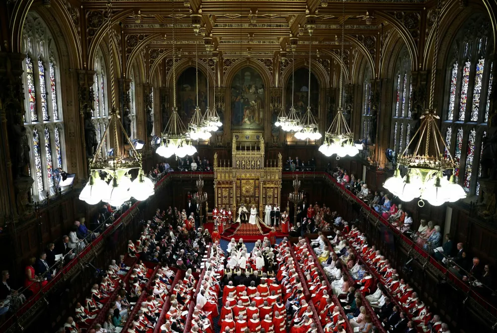 FILE PHOTO: Britain's King Charles III, wearing the Imperial State Crown and the Robe of State, reads the King's Speech from the The Sovereign's Throne in the House of Lords chamber, during the State Opening of Parliament, at the Houses of Parliament, in London, on July 17, 2024.   HENRY NICHOLLS/Pool via REUTERS/File Photo