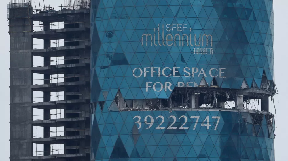 A building damaged in a reported Iranian drone strike, amid the U.S.-Israeli conflict with Iran, in Seef, Manama, Bahrain, March 10, 2026. REUTERS/Stringer   TPX IMAGES OF THE DAY