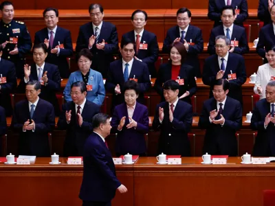 Chinese President Xi Jinping arrives for the closing session of the National People's Congress (NPC) at the Great Hall of the People in Beijing, China March 12, 2026. REUTERS/Tingshu Wang