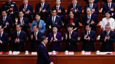 Chinese President Xi Jinping arrives for the closing session of the National People's Congress (NPC) at the Great Hall of the People in Beijing, China March 12, 2026. REUTERS/Tingshu Wang