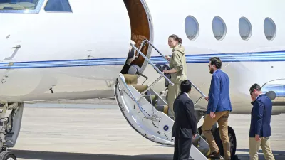 This photo released by the state-run WAM news agency shows U.S.-Russian dual national Ksenia Karelina getting on a private jet after her release at an airport in Abu Dhabi, United Arab Emirates, Thursday, April 10, 2025. (WAM via AP)