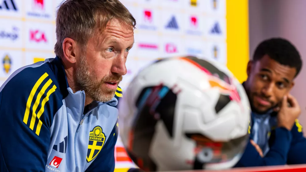 FILE - Sweden's head coach Graham Potter, left, speaks to the media during a press conference of Sweden team, one day before the FIFA 2026 World Cup Group B qualifying soccer match against Switzerland, in Geneva, Switzerland, Friday, Nov. 14, 2025. (Salvatore Di Nolfi/Keystone via AP, File)