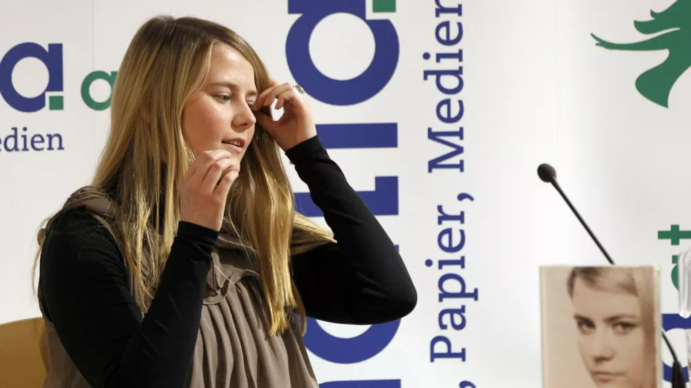 Natascha Kampusch, during the presentation of her book "3,096 Tage" (3,096 Days) at a book store in Vienna, Austria, on Thursday, Sept. 9, 2010. Kampusch, who was kidnapped at age 10 says she was repeatedly beaten, starved and forced to do housework half-naked during her 8 1/2 years at the mercy of a man who admired Hitler and considered himself an Egyptian god. (AP Photo/Leonhard Foeger, Pool)