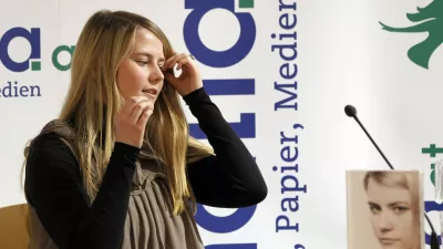 Natascha Kampusch, during the presentation of her book "3,096 Tage" (3,096 Days) at a book store in Vienna, Austria, on Thursday, Sept. 9, 2010. Kampusch, who was kidnapped at age 10 says she was repeatedly beaten, starved and forced to do housework half-naked during her 8 1/2 years at the mercy of a man who admired Hitler and considered himself an Egyptian god. (AP Photo/Leonhard Foeger, Pool)