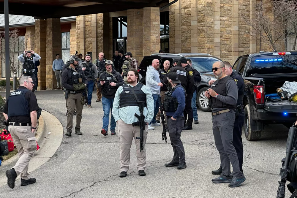 Law enforcement respond to a call at Temple Israel synagogue in West Bloomfield Township, Mich. (AP Photo/Corey Williams)
