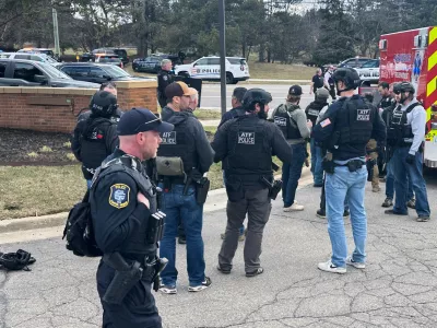 Law enforcement respond to a call at Temple Israel synagogue on Thursday, March 12, 2026, in West Bloomfield Township, Mich. (AP Photo/Corey Williams)