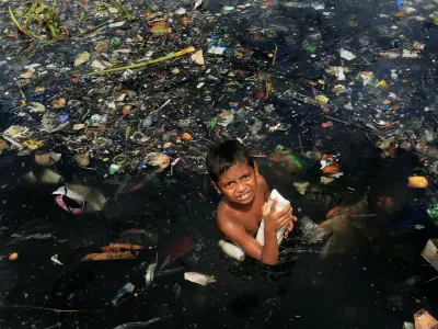 Nov 25, 2013 - Dhaka, Bangladesh - The Buriganga river is economically very important to Dhaka. The chemical waste of mills and factories, household waste, medical waste, sewage, dead animals, plastics, and oil are some of the Buriganga's pollutants. The city of Dhaka discharges about 4,500 tons of solid waste every day and most of it is released into the Buriganga. Nearly 4.0 million people of the city are exposed to the consequences of water pollution every day. The most pollution creating industries of Bangladesh are tanning industries concentrated mainly in Hazaribagh area in the south-western part of Dhaka with about 170 tannery units.,Image: 206972677, License: Rights-managed, Restrictions:, Model Release: no