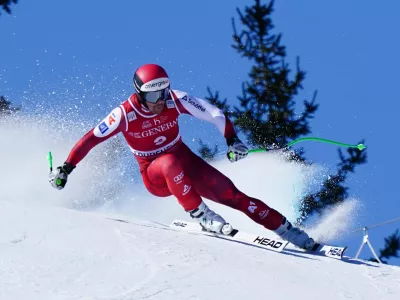 Austria's Vincent Kriechmayr speeds down the course during an alpine ski, men's World Cup downhill race, in Courchevel, France, Friday, March 13, 2026. (AP Photo/Pier Marco Tacca)