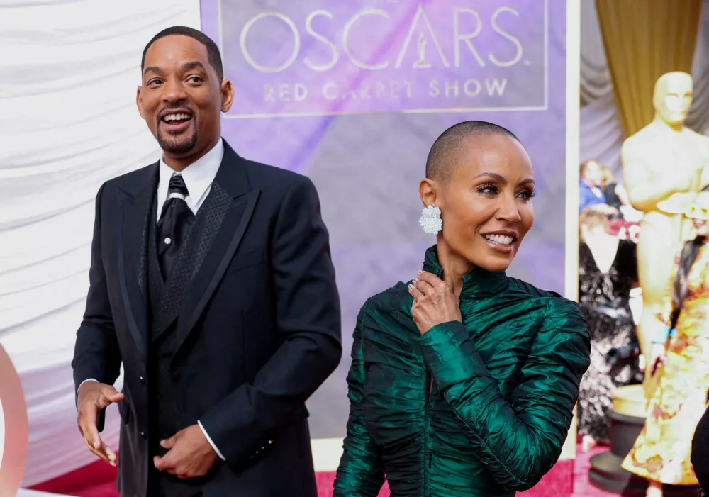 FILE PHOTO: Will Smith and Jada Pinkett Smith pose on the red carpet during the Oscars arrivals at the 94th Academy Awards in Hollywood, Los Angeles, California, U.S., March 27, 2022. REUTERS/Mike Blake/File Photo
