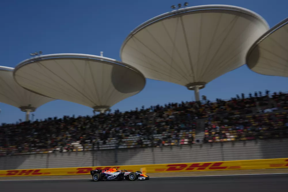 acing Bulls driver Liam Lawson of New Zealand steers his car during the first practice session ahead of the Chinese Formula One Grand Prix, in Shanghai, China, Friday, March 13, 2026. (AP Photo/Andy Wong)