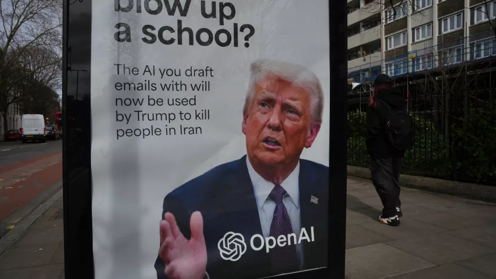A poster featuring U.S. President Donald Trump, which was installed by protesters from the group 'Everyone hates Elon', is seen at a bus stop in London, Friday, March 13, 2026. (AP Photo/Kin Cheung)
