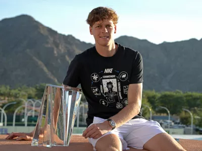 Mar 15, 2026; Indian Wells, CA, USA; Jannik Sinner (ITA) with the championship trophy after he defeated Daniil Medvedev (RUS) in the menŐs final of the BNP Paribas Open at the Indian Wells Tennis Garden. Mandatory Credit: Jayne Kamin-Oncea-Imagn Images