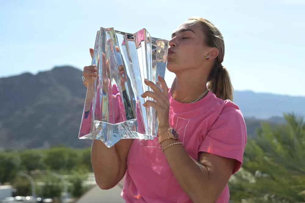 Mar 15, 2026; Indian Wells, CA, USA; Aryna Sabalenka (BEL) holds the championship trophy after winning the womenŐs final of the BNP Paribas Open defeating Elena Rybakina (KAZ) at the Indian Wells Tennis Garden. Mandatory Credit: Jayne Kamin-Oncea-Imagn Images