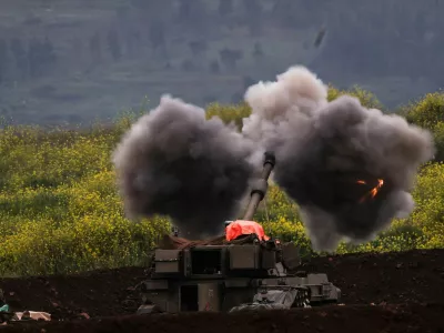 An Israeli artillery unit fires, amid escalation between Hezbollah and Israel, and amid the U.S.-Israeli conflict with Iran, on the Israeli side of the Israel-Lebanon border, March 15, 2026. REUTERS/Shir Torem   TPX IMAGES OF THE DAY