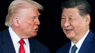 FILE PHOTO: U.S. President Donald Trump and Chinese President Xi Jinping talk as they leave after a bilateral meeting at Gimhae International Airport, on the sidelines of the Asia-Pacific Economic Cooperation (APEC) summit, in Busan, South Korea, October 30, 2025. REUTERS/Evelyn Hockstein/File Photo