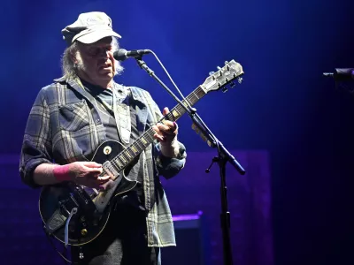GLASTONBURY, ENGLAND - JUNE 28: (EDITORIAL USE ONLY) Neil Young during day four of Glastonbury festival 2025 at Worthy Farm, Pilton on June 28, 2025 in Glastonbury, England. Established by Michael Eavis in 1970, Glastonbury has grown into the UK's largest music festival, drawing over 200,000 fans to enjoy performances across more than 100 stages. In 2026, the festival will take a fallow year, a planned pause to allow the Worthy Farm site time to rest and recover. (Photo by Samir Hussein/WireImage)