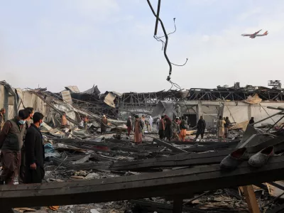 Residents and volunteers inspect the site of a late-Monday airstrike at a drug rehabilitation hospital in Kabul, Afghanistan, Tuesday, March 17, 2026. (AP Photo/Siddiqullah Alizai)