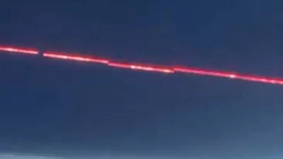 A C-RAM air defence system intercepts drones during reported drone and rocket attacks on the U.S. embassy, according to Iraqi security sources, in Baghdad, Iraq, in this still image obtained from a social media video released on March 17, 2026. Social Media via REUTERS THIS IMAGE HAS BEEN SUPPLIED BY A THIRD PARTY. NO RESALES. NO ARCHIVES. NEWS USE ONLY.  VERIFICATION: Reuters was able to confirm the location from the shape of the building, road layout, street lights and vegetation. Exact time could not be verified but no older version of the video was found posted online before March 17. Iraqi security sources confirmed that rockets and at least five drones were launched at the U.S. embassy in Baghdad early on Tuesday. The direction of the C-RAM air defence system was seen moving towards the opposite side of the embassy. Earlier, a Reuters witness confirmed seeing at least three drones heading in the direction of the embassy. Coordinates of the building under attack are 33.29164731525183, 44.390272740582226