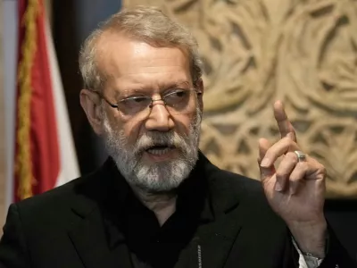 FILE -Iranian Secretary of Supreme National Security Council Ali Larijani, speaks during a press conference after his meeting with the Lebanese parliament speaker Nabih Berri, in Beirut, Lebanon, Aug. 13, 2025. (AP Photo/Bilal Hussein, File)