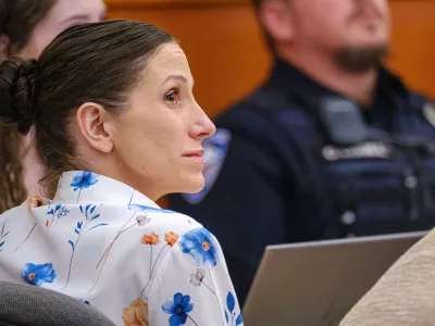 Defendant Kouri Richins, left, accused of poisoning her husband in March 2022, listens to closing arguments in Third District Court, Monday, March 16, 2026, in Park City, Utah. (David Jackson/Pool Photo via AP)