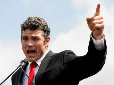 FILE PHOTO: Joe Kent, who is running for Washington's 3rd congressional district, delivers a speech during a rally in support of defendants being prosecuted in the January 6 attack on the Capitol, in Washington, U.S., September 18, 2021. REUTERS/Elizabeth Frantz/File Photo