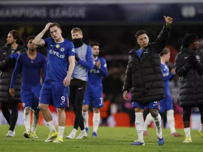 Soccer Football - UEFA Champions League - Round 16 - Second Leg - Chelsea v Paris St Germain - Stamford Bridge, London, Britain - March 17, 2026 Chelsea's Enzo Fernandez and Liam Delap look dejected after the match Action Images via Reuters/Andrew Couldridge