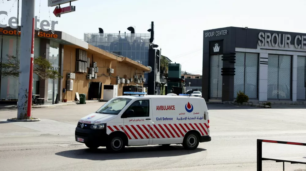 An ambulance in front of an Amana gas station in the aftermath of a strike, following an escalation between Hezbollah and Israel amid the U.S.-Israeli conflict with Iran, in Al Hosh, Tyre, Lebanon, March 18, 2026. REUTERS/ Amr Abdallah Dalsh