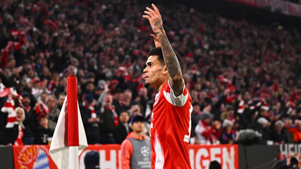 Bayern Munich's Luis D&iacute;az celebrates after a goal against Atalanta Bergamo, Wednesday, March 18, 2026, in Munich, Germany. (Tom Weller/dpa via AP)