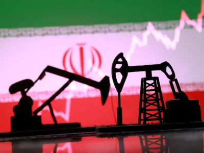 FILE PHOTO: 3D-printed oil pump jacks, Iranian flag, and a rising stock graph appear in this illustration taken March 2, 2026. REUTERS/Dado Ruvic/Illustration/File Photo