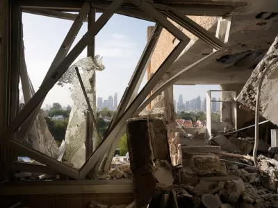 Damaged apartment following an Iranian missile strike in Tel Aviv, Israel, March 19, 2026. (AP Photo/Maya Levin)