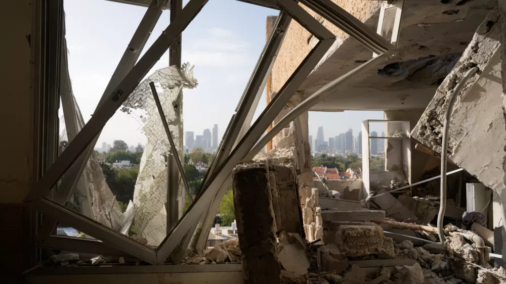 Damaged apartment following an Iranian missile strike in Tel Aviv, Israel, March 19, 2026. (AP Photo/Maya Levin)