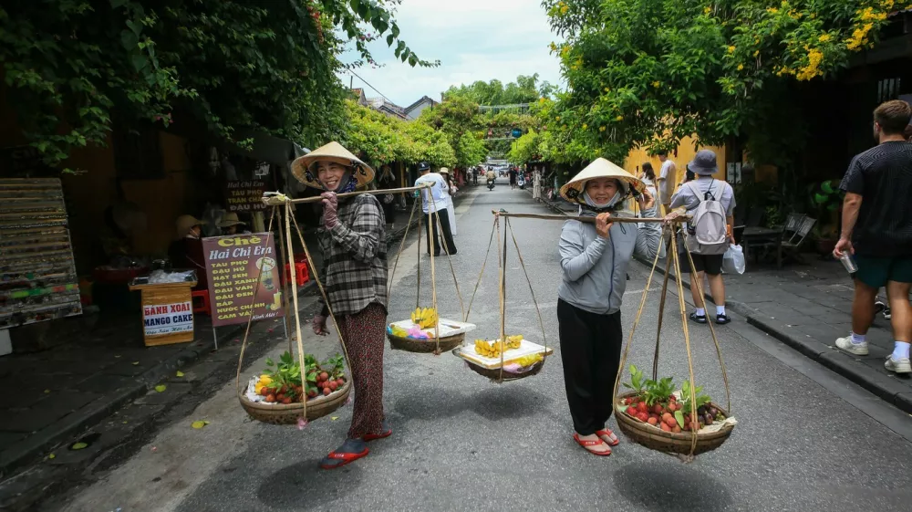 HOI AN, VIETNAM - JULY 11: A view of the city as daily life continues in ancient Town of Hoi An, which was one of Southeast Asia's most important trading ports from the 15th to the 19th century, in Vietnam on July 11, 2025. Located on the banks of the Thu Bon River, the town was inscribed on the UNESCO World Heritage List in 1999. The loss of the port's function in the 19th century played a key role in preserving Hoi An's narrow streets, traditional wooden buildings, and unique urban fabric to the present day. Bearing traces of Chinese, Japanese, and European cultures, the town features more than a thousand wooden-framed structures, temples, shops, and inns lining its narrow streets. According to UNESCO, Hoi An is considered one of the best-preserved ancient port settlements in Asia. UmmU Nisan Kandilcioglu / Anadolu/ABACAPRESS.COM,Image: 1029367048, License: Rights-managed, Restrictions:, Model Release: no