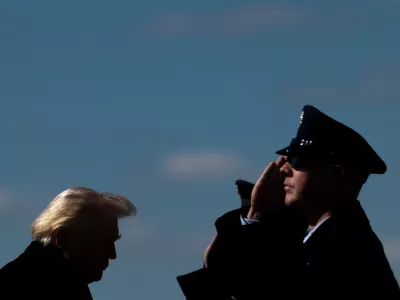 President Donald Trump walks to board Air Force One at Dover Air Force Base, Del., Wednesday, March 18, 2026, after attending the casualty return for the six crew members of an Air Force refueling aircraft who died when their plane crashed in western Iraq while supporting operations against Iran. (AP Photo/Julia Demaree Nikhinson)