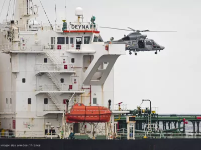 A French Navy helicopter hovers over the Deyna vessel, which is supposed to be a member of the Russian shadow fleet, during an operation in the Western Mediterranean Sea, in this handout image obtained by Reuters on March 20, 2026. Prefecture maritime de la Mediterranee/Etat Major des Armees/Handout via REUTERS  THIS IMAGE HAS BEEN SUPPLIED BY A THIRD PARTY