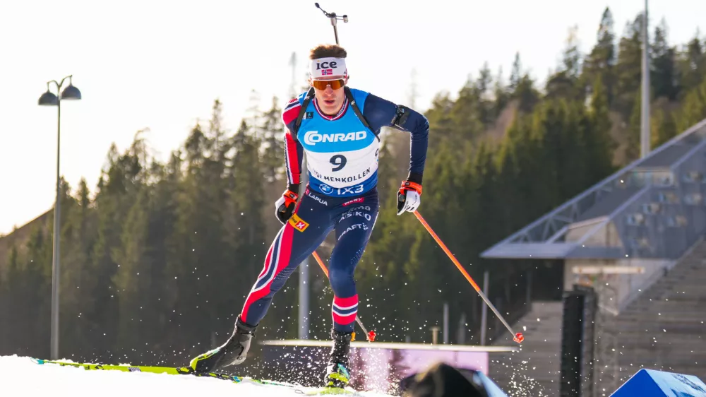 Sturla Holm L&aelig;greid competes in the Biathlon men's World Cup 10 km sprint, in Holmenkollen, Norway, Friday, March 20, 2026. (Heiko Junge/NTB Scanpix via AP)
