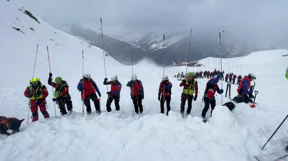 Rescuers search on the site where an avalanche broke loose in Val Ridanna, in Alto Adige, northern Italy, engulfing a group of 10 skiers Saturday, March 21, 2026. (Italian Alpine the National Alpine and Speleological Rescue Corps Trentino Via AP)