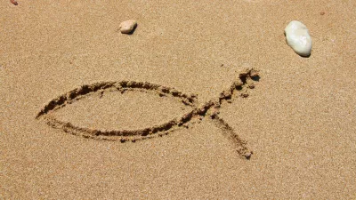 Domnevno so se prvi kristjani v Rimu prepoznali tako, da so v pesek narisali ta simbol. / Foto: Istock