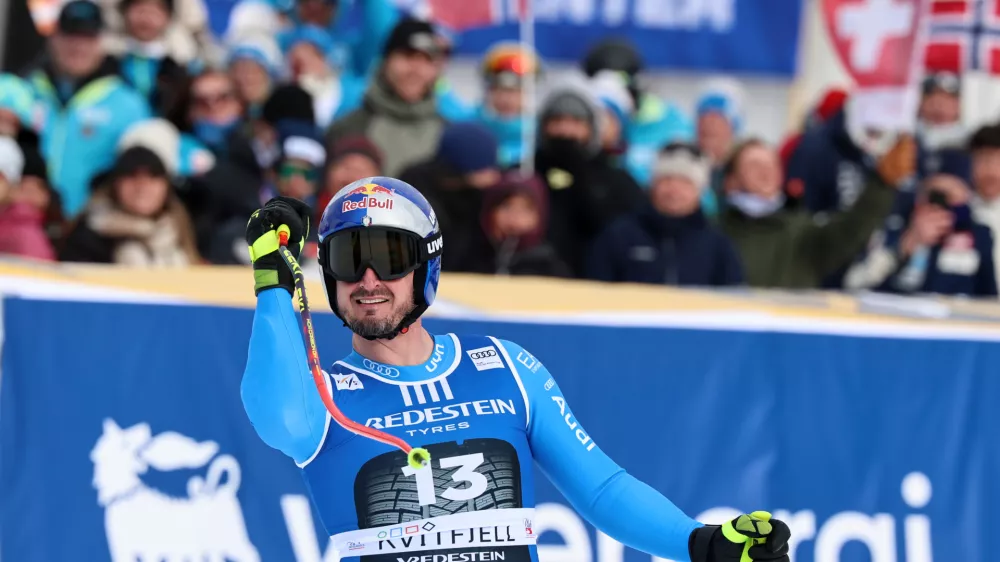 Italy's Dominik Paris celebrates at the finish area of an alpine ski, men's super-G race, at the Lillehammer World Cup Finals, in Kvitfjell, Norway, Sunday, March 22, 2026. (AP Photo/Marco Trovati)
