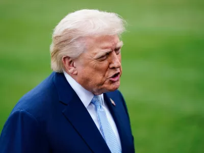 U.S. President Donald Trump speaks to the media as he departs the White House for Florida, in Washington, D.C., U.S., March 20, 2026. REUTERS/Nathan Howard